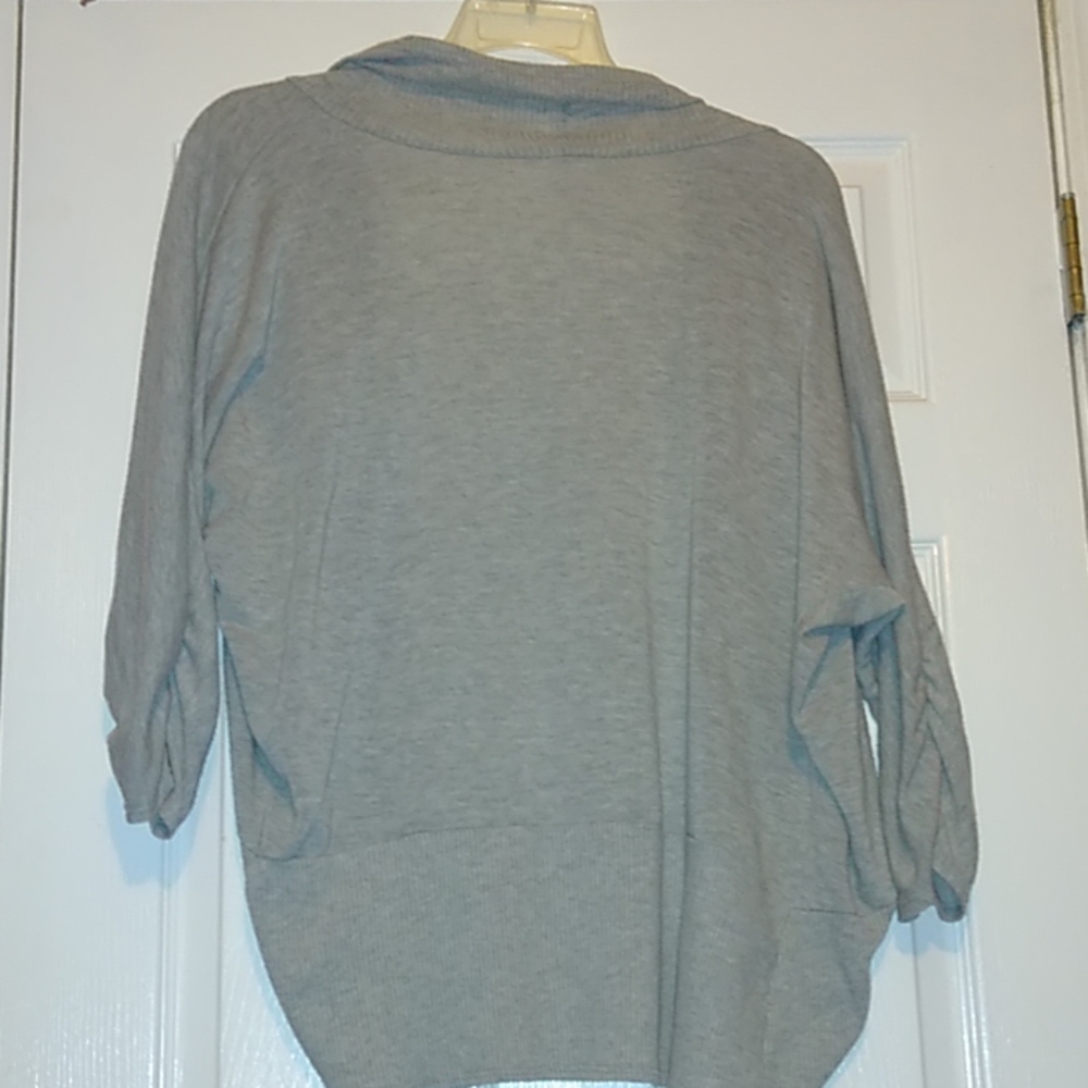 Discreet Shrug - Picture 2 of 3